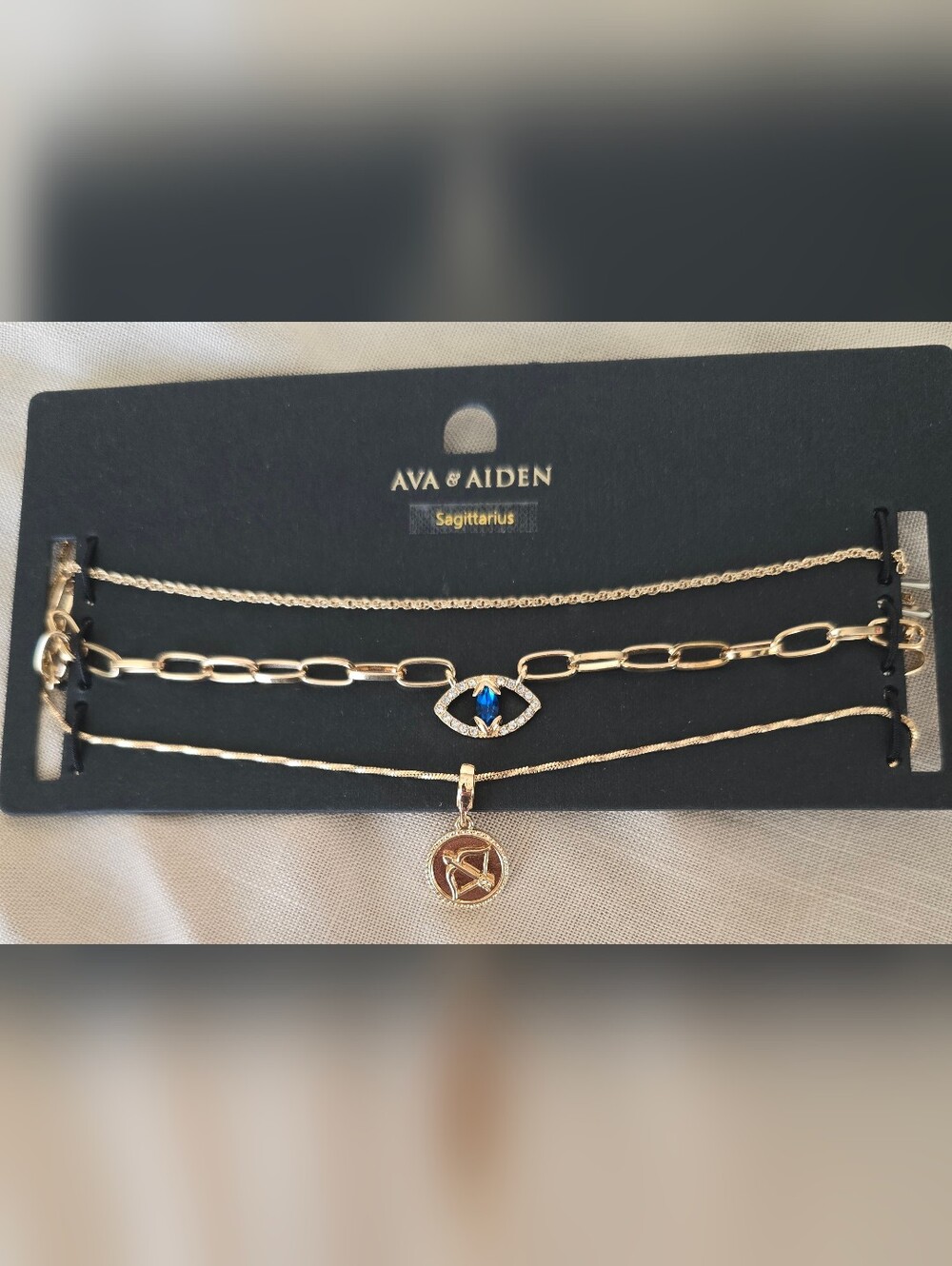 AVA & AIDEN Gold-Tone Sagittarius Layered Necklace Set with Blue Accent